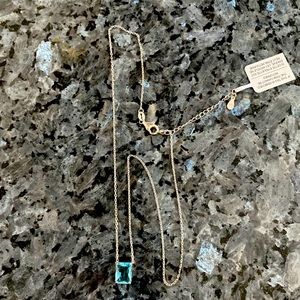 Necklace. New in box. Sterling sliver chain with Gem
